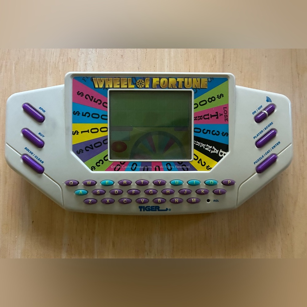 1995 Tiger Electronics Wheel of Fortune Handheld Game Tiger Electronics - Works